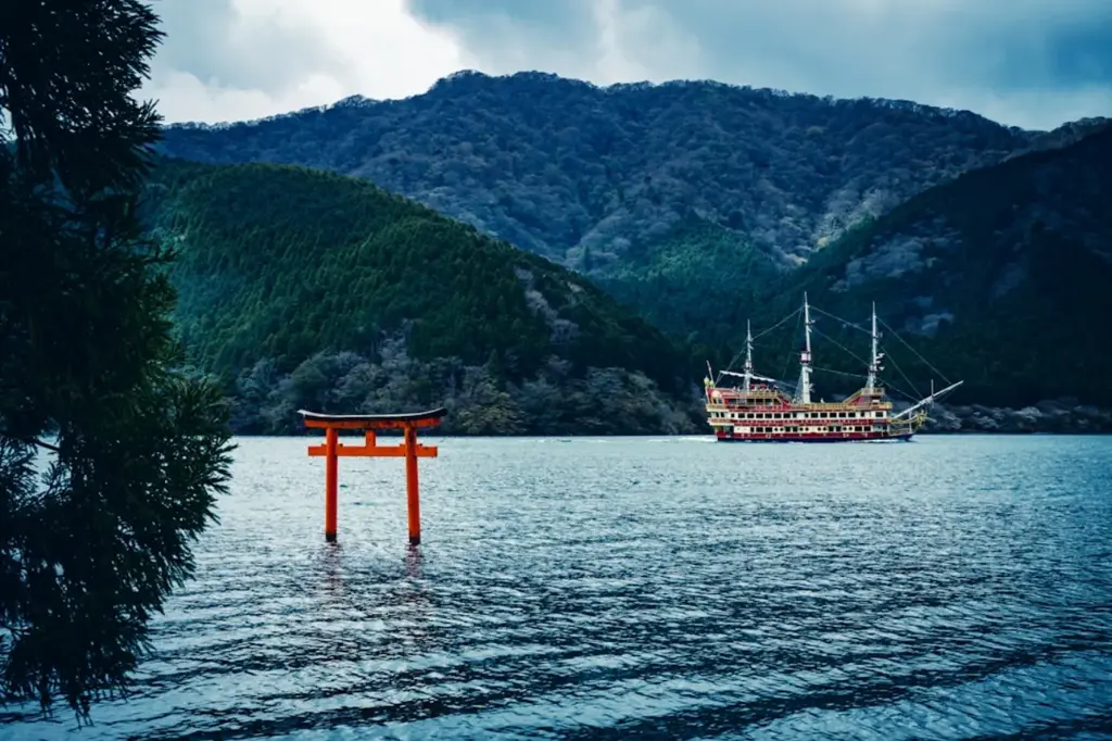 Lake Ashi with torii gate and Mt. Fuji in the distance